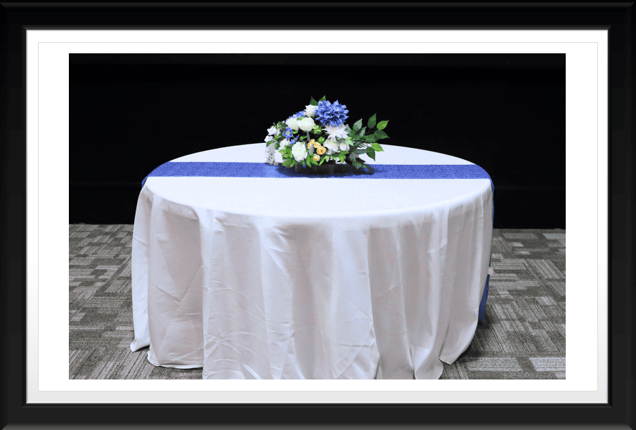 TABLE WITH RUNNER AND FLOWER