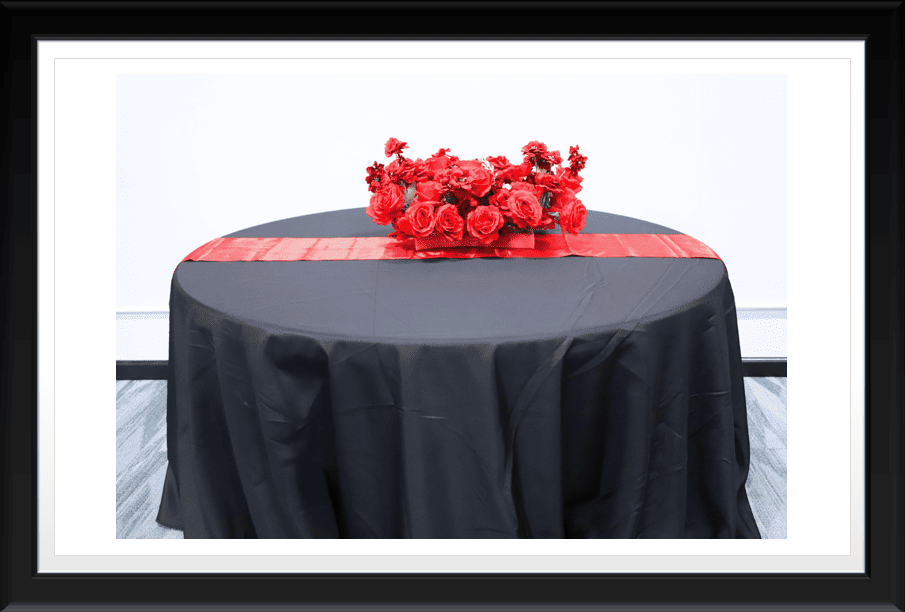TABLE WITH RUNNER AND FLOWER