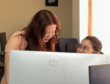 Family reviewing real estate plans